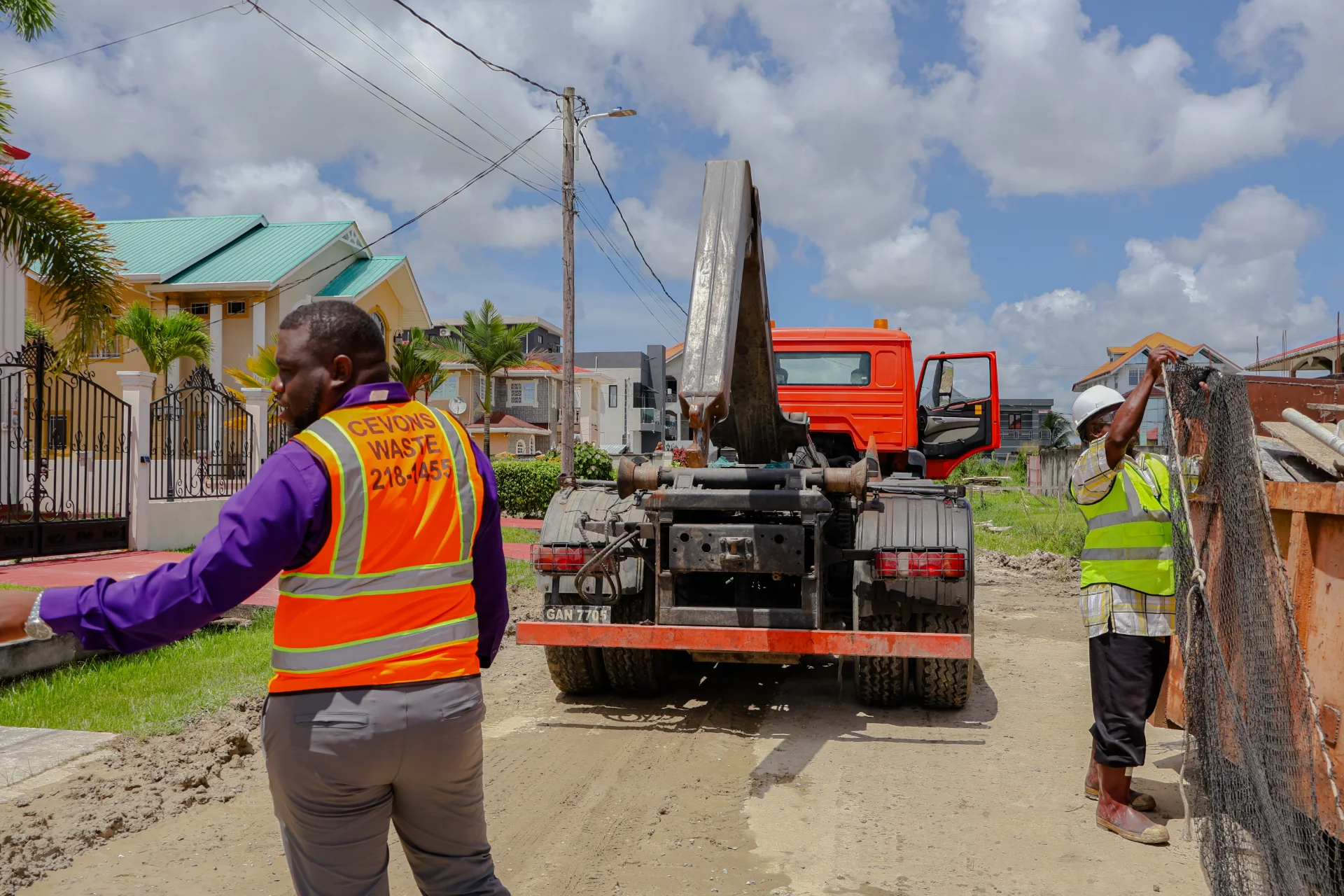 CEVONS waste management trucks, equipment, and environmental service team
